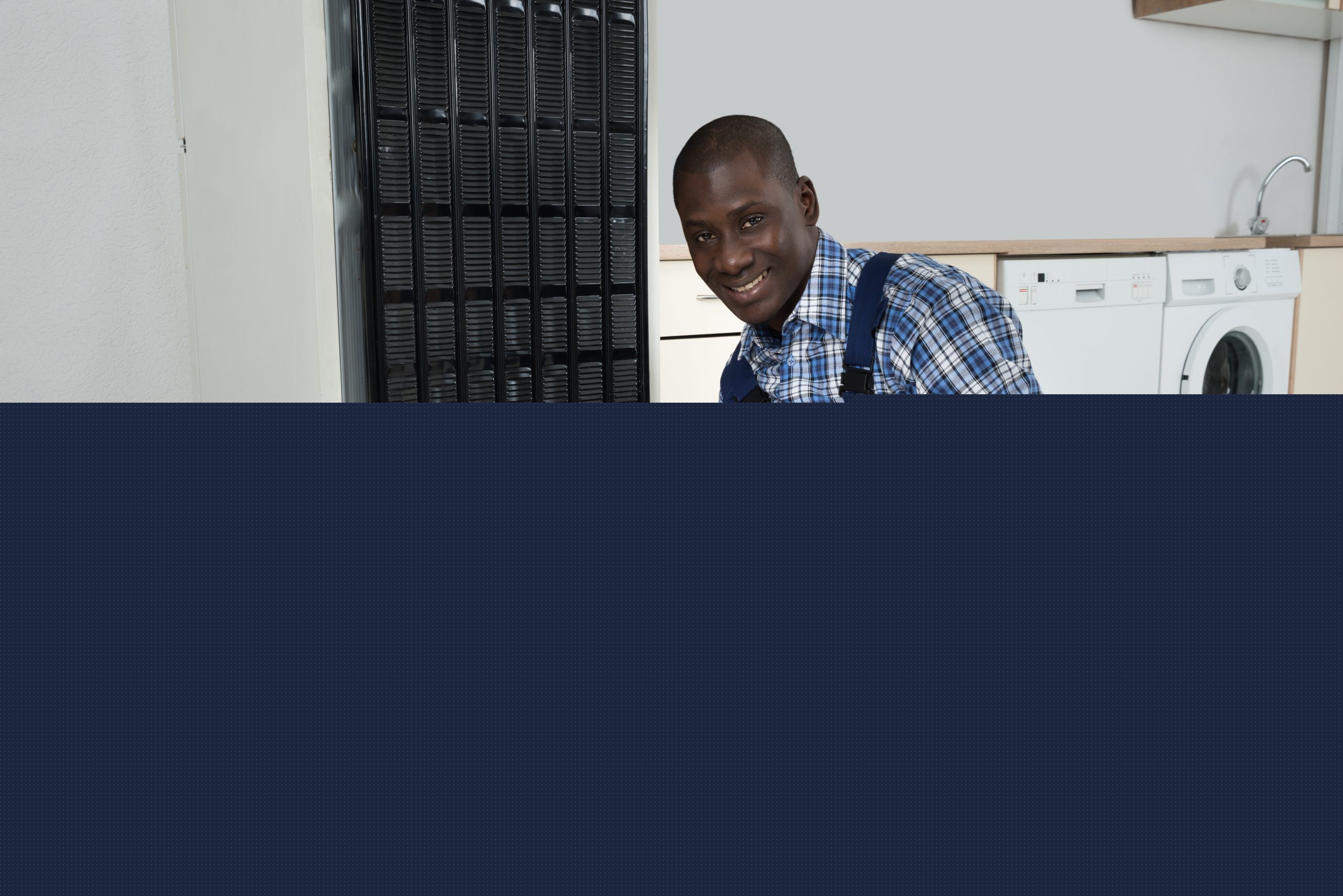 Technician Fixing Refrigerator